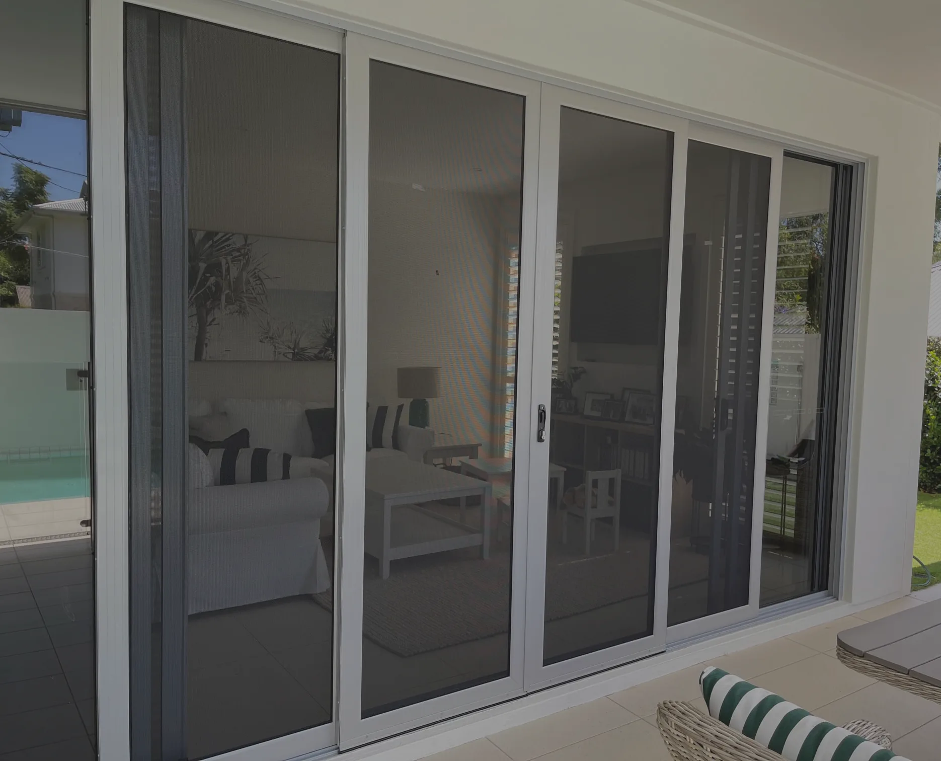 Panther Protect security mesh sliding doors on a modern home